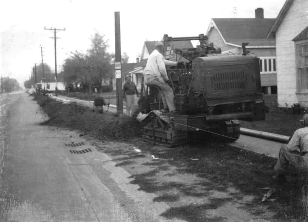Historic photo of road paving and curbing